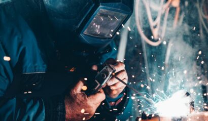 man using welding machine